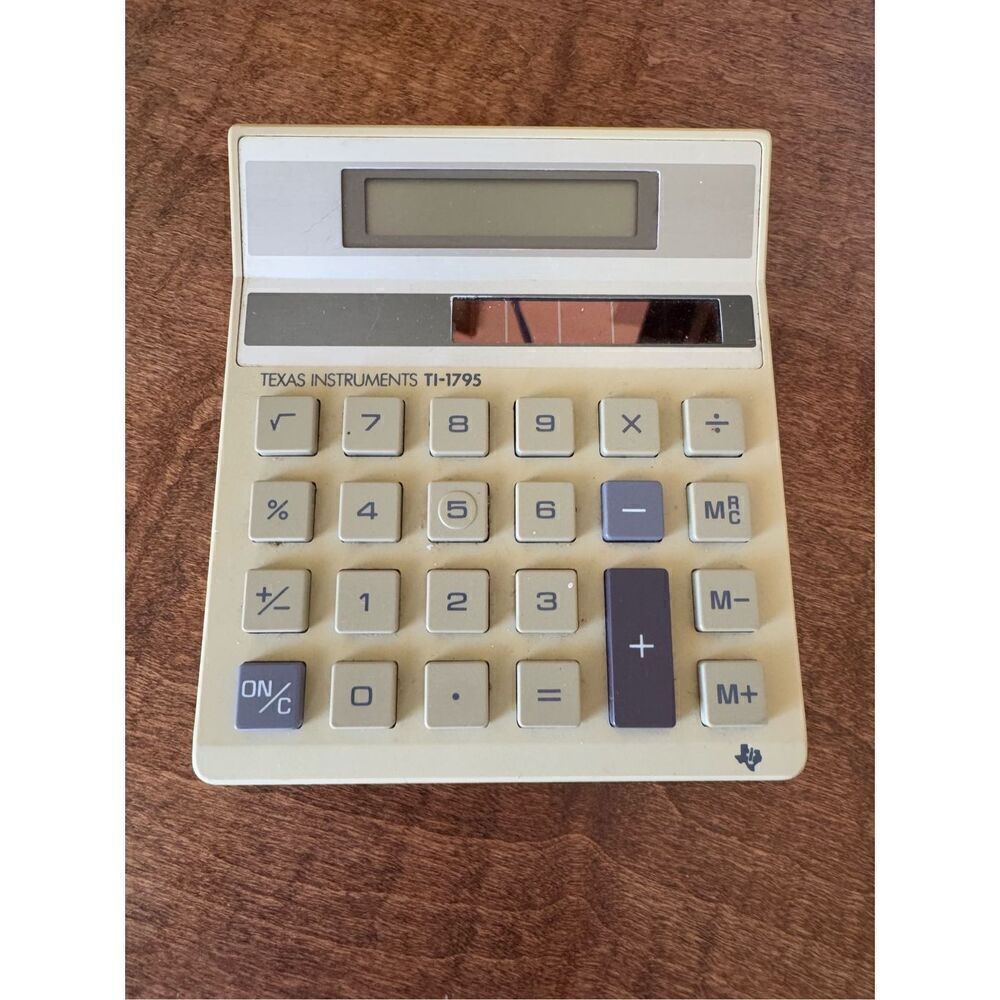 Texas Instruments Solar powered by sun like Superman vintage calculator c-1286a